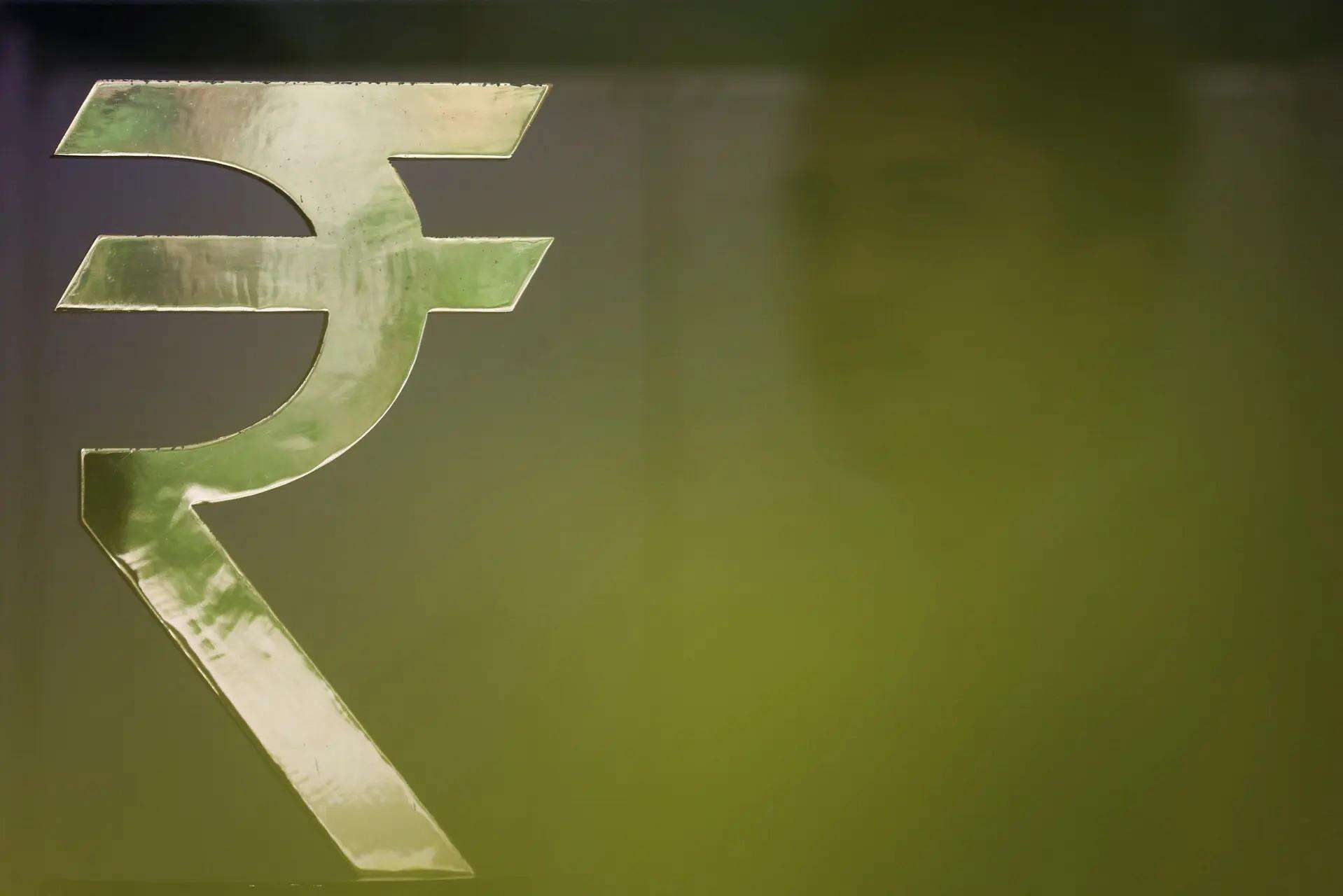 Rupee Gains 14 Paise Against US Dollar