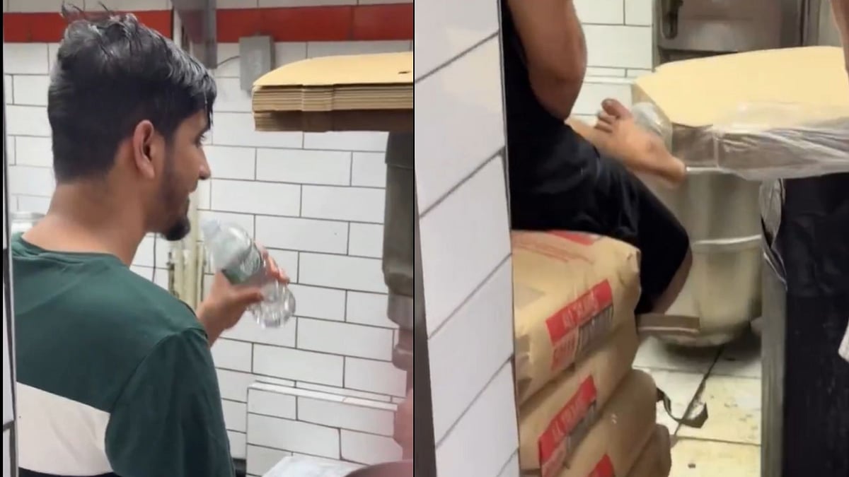 Worker Puts Bare Foot On Pizza Dough Mixer