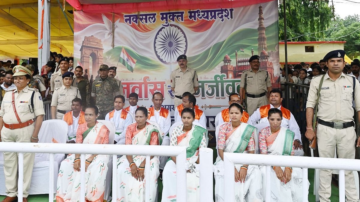 Surrendered Naxalites Hold Tricolour in MP's Balaghat