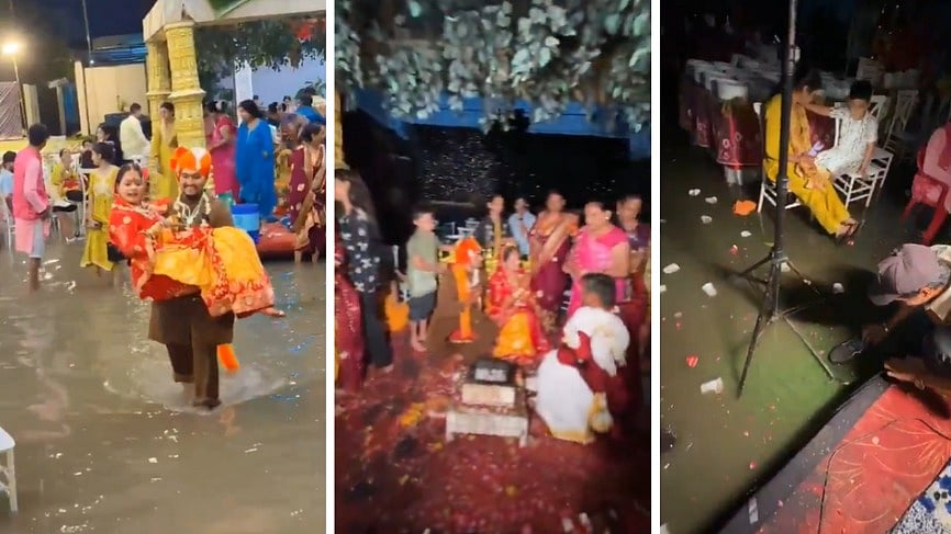 Groom Carries Bride Through Flooded Wedding Venue