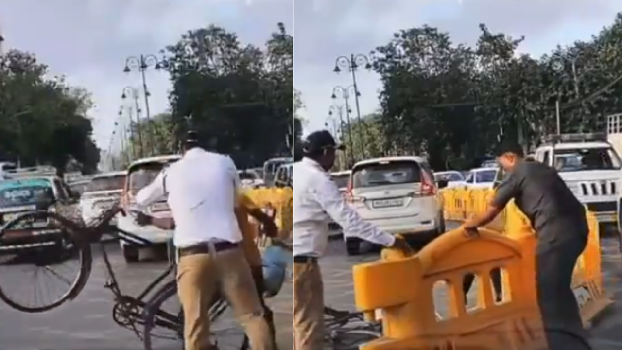 Mumbai Cop Shoves Cyclist for VIP Convoy