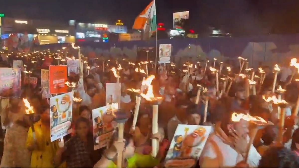 Odisha Youth Congress Holds Torch Rally Against BJP Govt